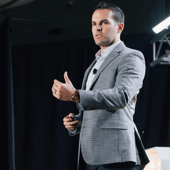 Bryce Presenting on Stage
